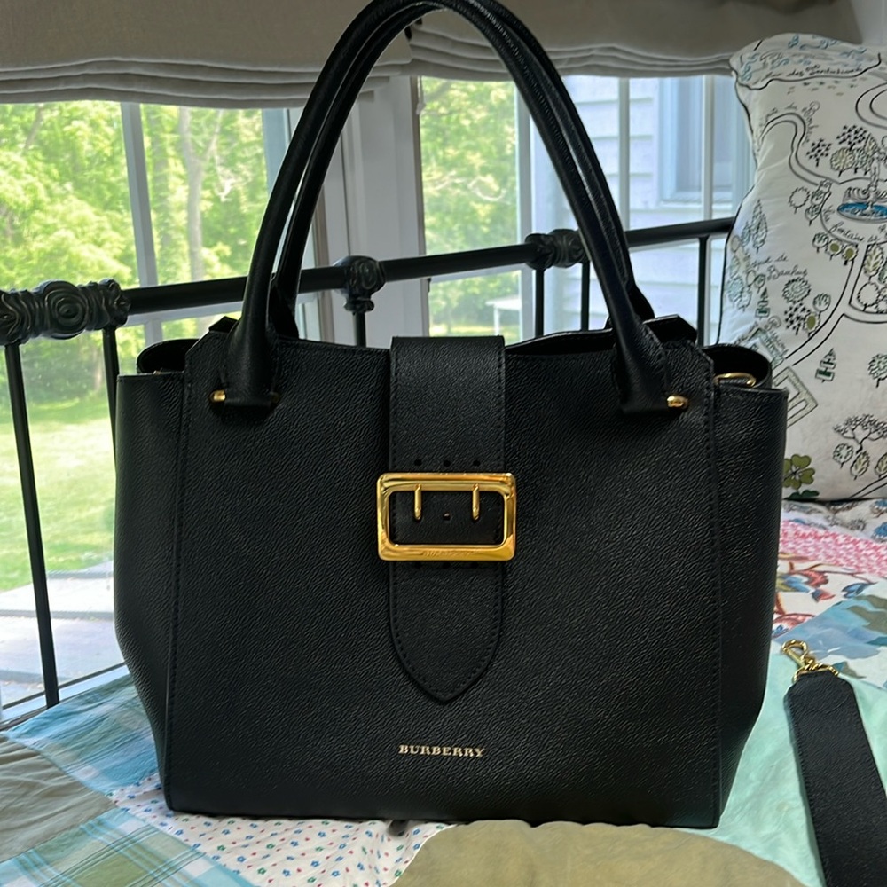 Burberry Handbag. 7” handles. 11 1/2” shoulder strap (removable). Used just 2x